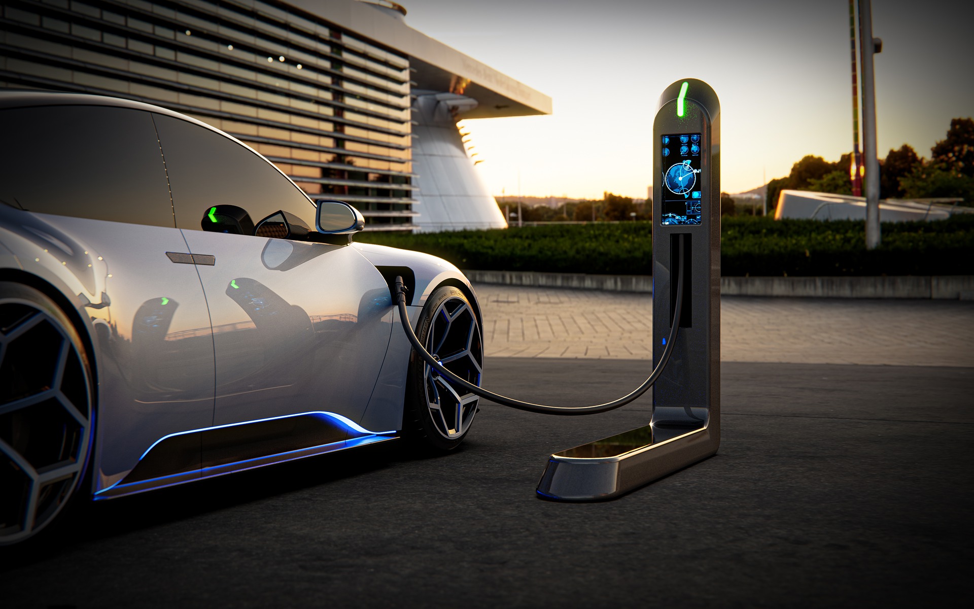 An electric car charging at a charging point